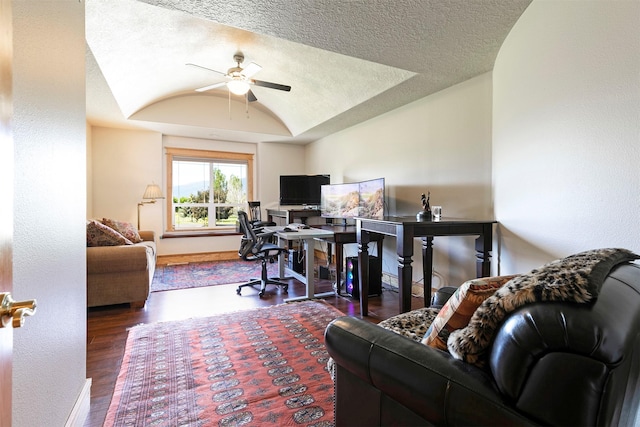 424 Saddle Ridge Rd, Hamilton, MT 59840 - office area with ceiling fan, vaulted ceiling, wood finished floors, and a textured ceiling