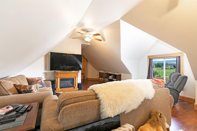424 Saddle Ridge Rd, Hamilton, MT 59840 - bedroom featuring access to outside, wood finished floors, lofted ceiling, ceiling fan, and a glass covered fireplace