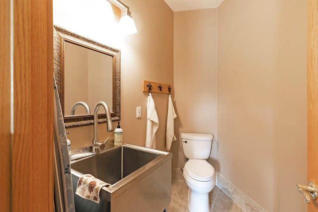 424 Saddle Ridge Rd, Hamilton, MT 59840 - half bath with toilet and tile patterned floors