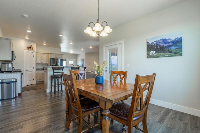 2110 Spring Wheat Loop, East Helena, MT 59635 - dining room featuring a chandelier, dark wood finished floors, recessed lighting, and plenty of natural light