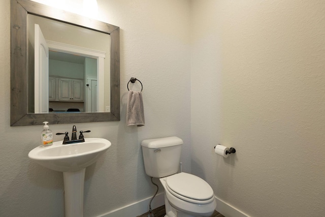 2110 Spring Wheat Loop, East Helena, MT 59635 - half bathroom with baseboards and toilet