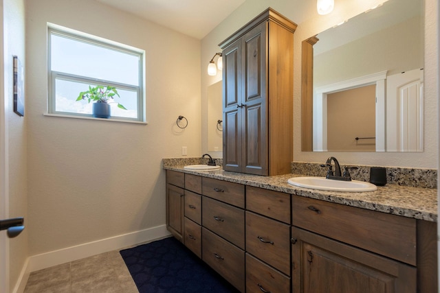 2110 Spring Wheat Loop, East Helena, MT 59635 - bathroom featuring double vanity and baseboards