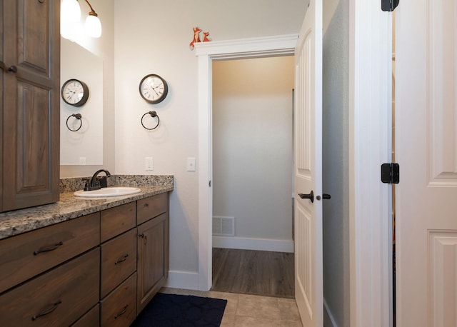 2110 Spring Wheat Loop, East Helena, MT 59635 - bathroom with vanity and tile patterned flooring