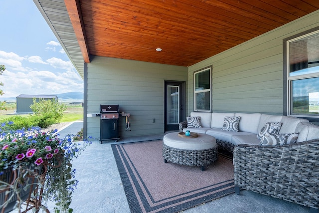 2110 Spring Wheat Loop, East Helena, MT 59635 - view of patio / terrace featuring a grill, outdoor lounge area, and a mountain view