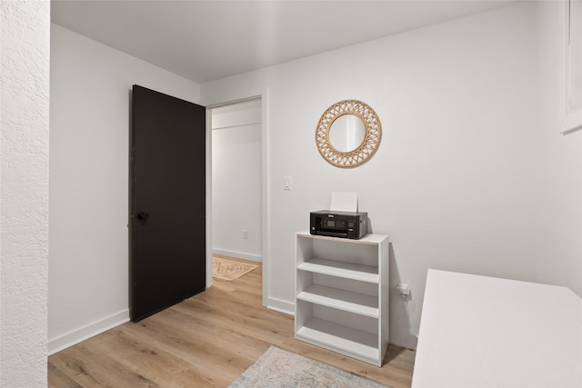 128 Mallard Loop, Whitefish, MT 59937 - hallway with light wood-type flooring and baseboards