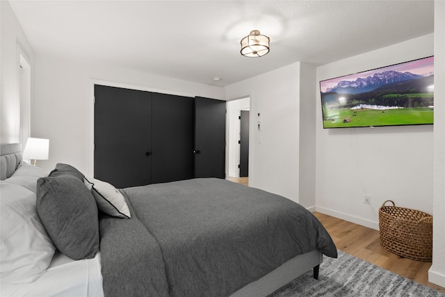 128 Mallard Loop, Whitefish, MT 59937 - bedroom with light wood-type flooring and baseboards