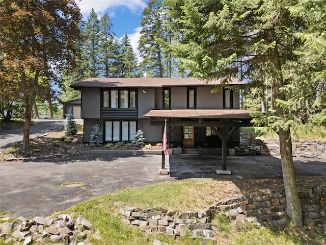 128 Mallard Loop, Whitefish, MT 59937 - view of front of home with stucco siding
