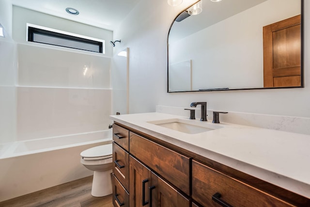 309 Stanton St, Plains, MT 59859 - full bath with vanity, wood finished floors, and shower / bath combination