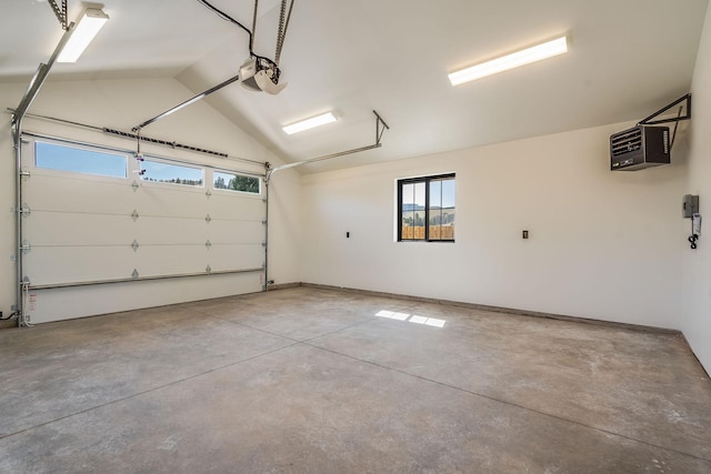 309 Stanton St, Plains, MT 59859 - garage featuring a heating unit and a garage door opener
