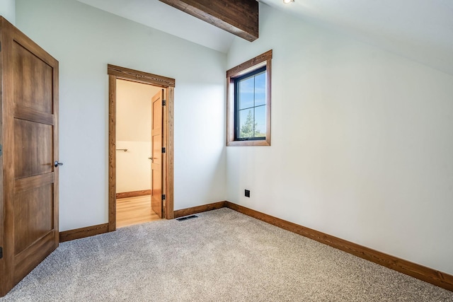 309 Stanton St, Plains, MT 59859 - unfurnished bedroom with light carpet and ensuite bathroom