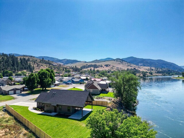 309 Stanton St, Plains, MT 59859 - aerial perspective of suburban area with a water and mountain view