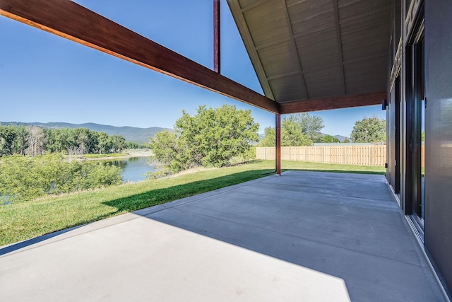 309 Stanton St, Plains, MT 59859 - view of patio with a water and mountain view