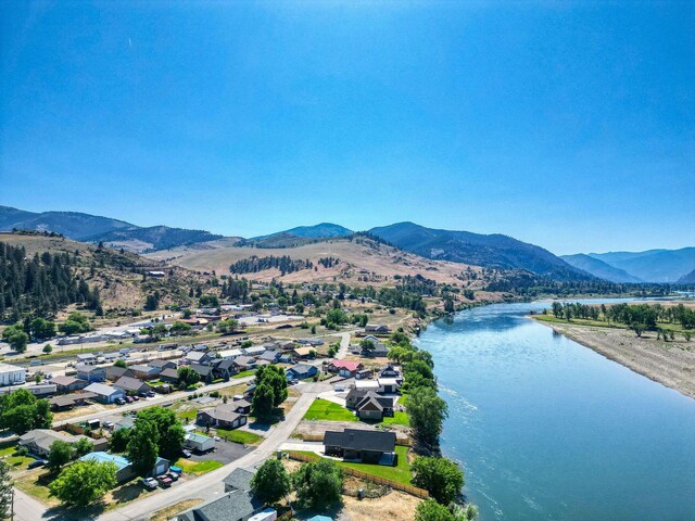 309 Stanton St, Plains, MT 59859 - aerial view of residential area featuring a water and mountain view