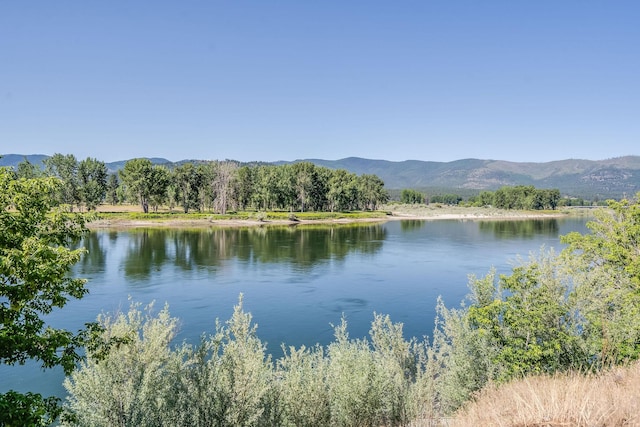 309 Stanton St, Plains, MT 59859 - water view featuring a mountain backdrop