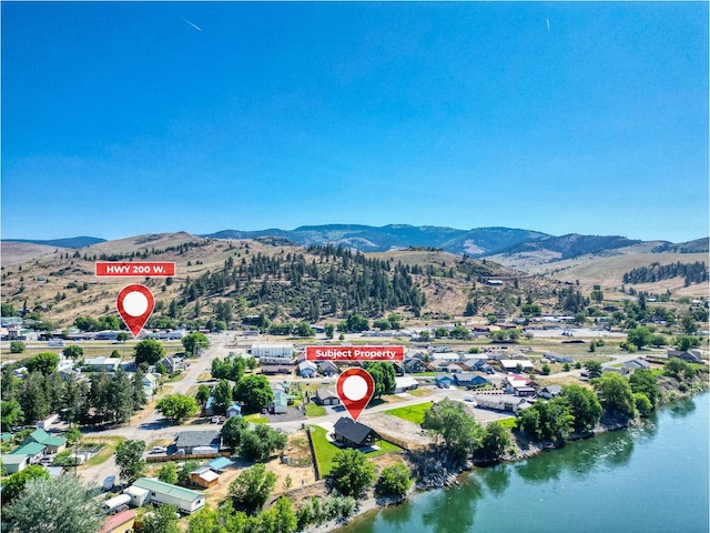 309 Stanton St, Plains, MT 59859 - aerial overview of property's location featuring a water and mountain view