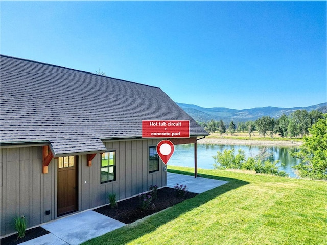 309 Stanton St, Plains, MT 59859 - exterior view of a water and mountain view and board and batten siding