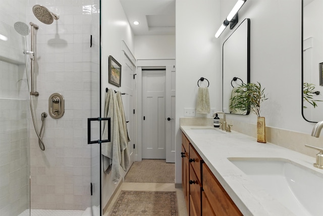 1219 Lolo St, Missoula, MT 59802 - bathroom featuring a shower stall, double vanity, recessed lighting, and tile patterned floors