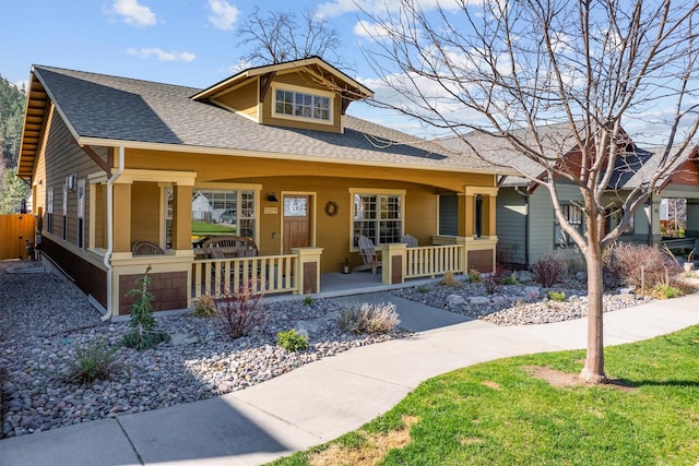 1219 Lolo St, Missoula, MT 59802 - view of front of house featuring a porch and a shingled roof