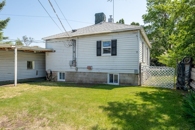 2515 S Higgins Ave, Missoula, MT 59801 - rear view of house featuring a chimney and roof with shingles
