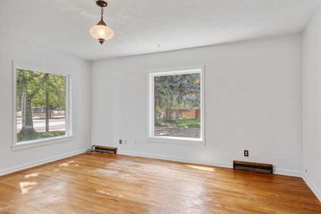 2515 S Higgins Ave, Missoula, MT 59801 - empty room featuring wood finished floors and baseboards