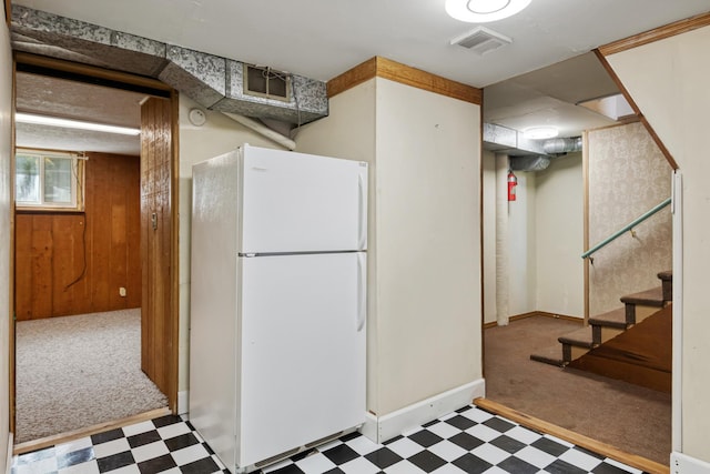 2515 S Higgins Ave, Missoula, MT 59801 - kitchen with freestanding refrigerator, tile patterned floors, and carpet floors
