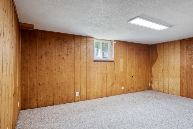 2515 S Higgins Ave, Missoula, MT 59801 - below grade area featuring carpet floors, wood walls, and a textured ceiling