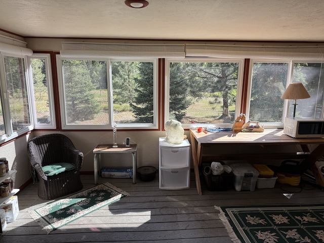 30 Idle Hour Way, Clinton, MT 59825 - sunroom / solarium featuring healthy amount of natural light, hardwood / wood-style flooring, and a deck