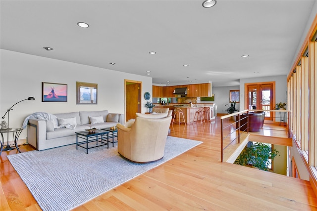 1087 Sunny Vista Rd, Helena, MT 59602 - living room featuring recessed lighting, light wood finished floors, and french doors