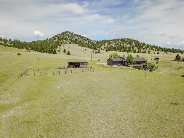 1087 Sunny Vista Rd, Helena, MT 59602 - view of yard with a rural view, a mountain view, and an outbuilding