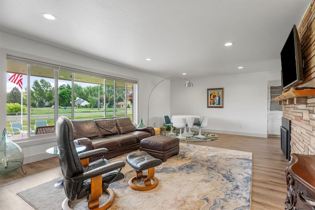 2709 Humble Rd, Missoula, MT 59804 - living area with recessed lighting, light wood finished floors, and a fireplace