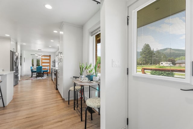 2709 Humble Rd, Missoula, MT 59804 - hall featuring plenty of natural light, light wood finished floors, and recessed lighting