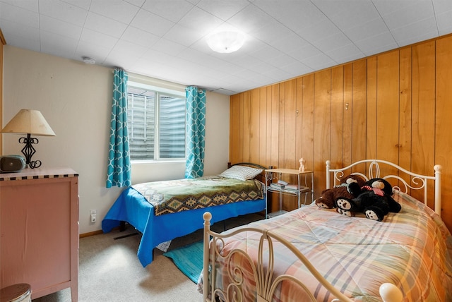 2709 Humble Rd, Missoula, MT 59804 - bedroom featuring wooden walls and carpet