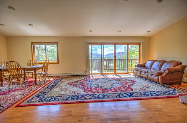 8319 Canyon Ferry Rd, Helena, MT 59602 - living room featuring healthy amount of natural light, wood finished floors, recessed lighting, and a mountain view