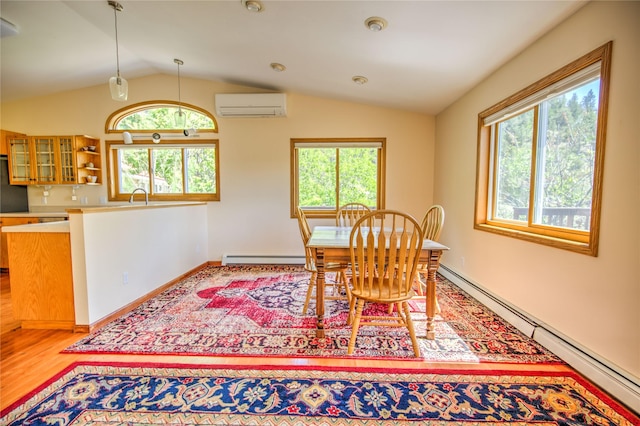 8319 Canyon Ferry Rd, Helena, MT 59602 - dining space with vaulted ceiling, a baseboard heating unit, baseboard heating, a wall unit AC, and healthy amount of natural light