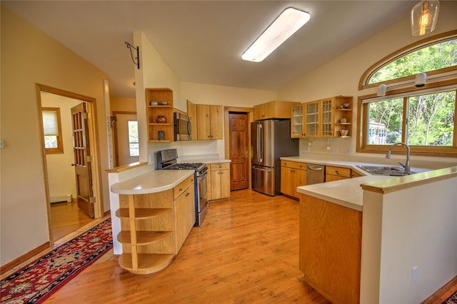 8319 Canyon Ferry Rd, Helena, MT 59602 - kitchen featuring open shelves, appliances with stainless steel finishes, vaulted ceiling, and a peninsula