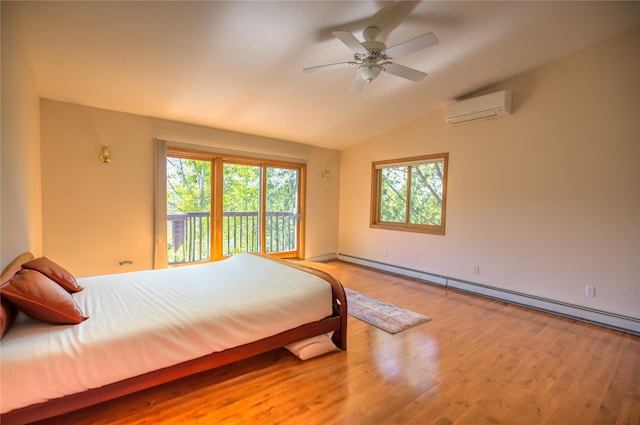 8319 Canyon Ferry Rd, Helena, MT 59602 - bedroom featuring an AC wall unit, a baseboard radiator, multiple windows, lofted ceiling, and wood finished floors