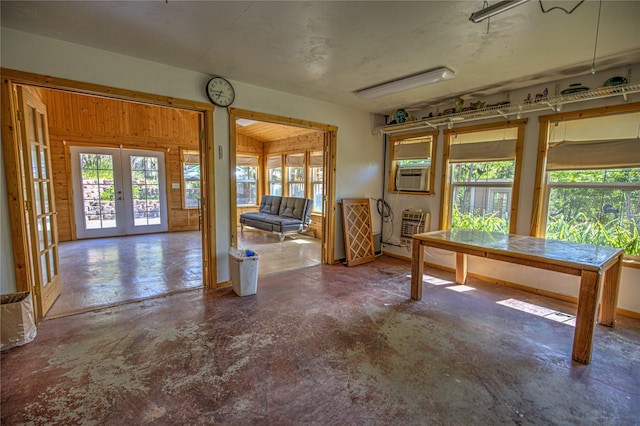 8319 Canyon Ferry Rd, Helena, MT 59602 - dining room featuring unfinished concrete floors, french doors, and cooling unit