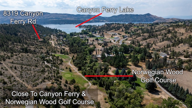8319 Canyon Ferry Rd, Helena, MT 59602 - aerial view of property's location featuring a water and mountain view and property parcel outlined