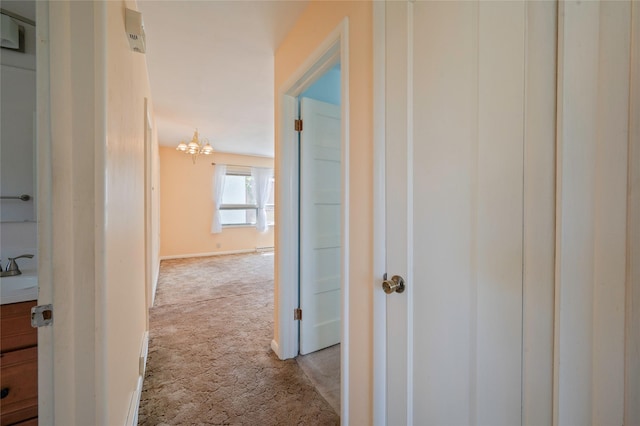 2129 E 6th Ave, Helena, MT 59601 - corridor featuring light colored carpet and a sink