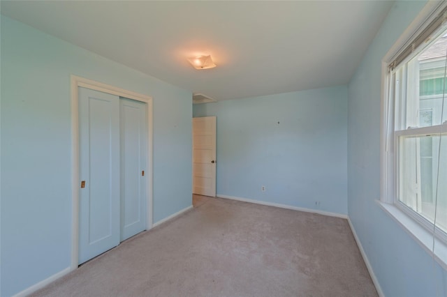 2129 E 6th Ave, Helena, MT 59601 - unfurnished bedroom with carpet floors and a closet