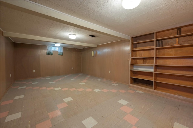 2129 E 6th Ave, Helena, MT 59601 - finished basement featuring light floors and wooden walls