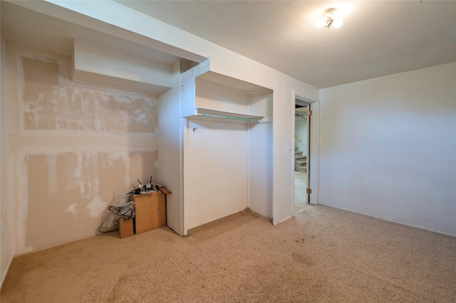 2129 E 6th Ave, Helena, MT 59601 - unfurnished bedroom with light colored carpet and a closet