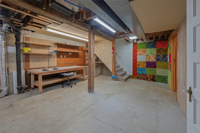 2129 E 6th Ave, Helena, MT 59601 - unfinished basement featuring a workshop area and stairs
