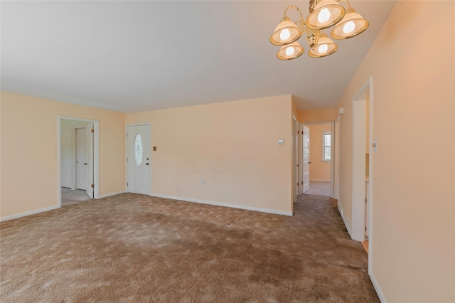 2129 E 6th Ave, Helena, MT 59601 - carpeted spare room with a chandelier and baseboards