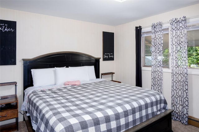 440 Dome Mountain Rd, Libby, MT 59923 - bedroom with baseboard heating and carpet flooring