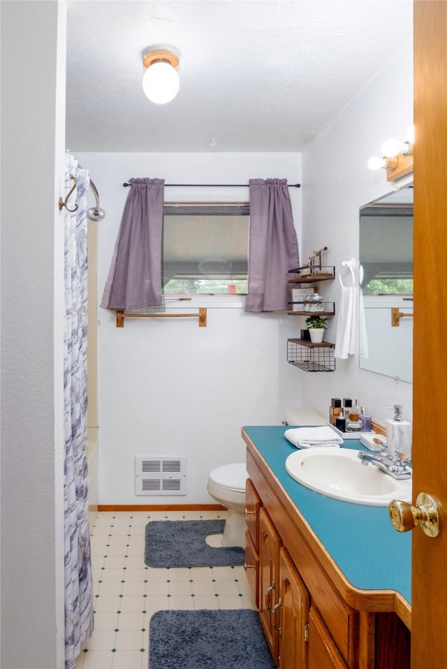 440 Dome Mountain Rd, Libby, MT 59923 - full bath featuring vanity, heating unit, and curtained shower