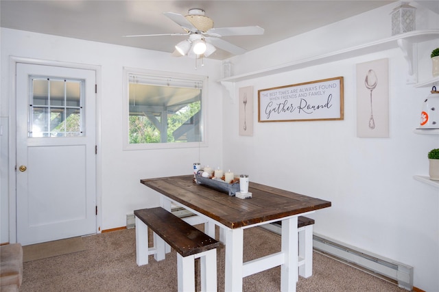 440 Dome Mountain Rd, Libby, MT 59923 - dining room featuring light colored carpet, baseboard heating, and ceiling fan