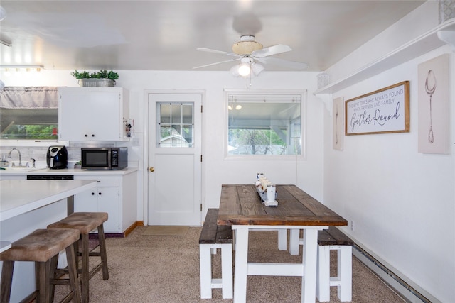 440 Dome Mountain Rd, Libby, MT 59923 - dining space featuring light carpet and ceiling fan