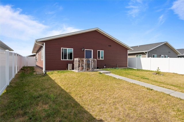 2009 22nd Ave S, Great Falls, MT 59405 - back of house with a fenced backyard
