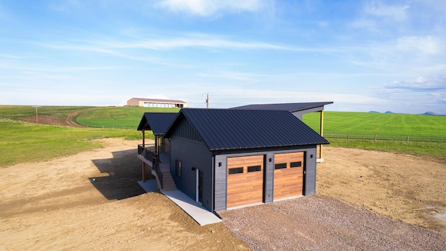 406 2nd Rd SW, Fairfield, MT 59436 - view of outbuilding featuring a view of countryside and dirt driveway